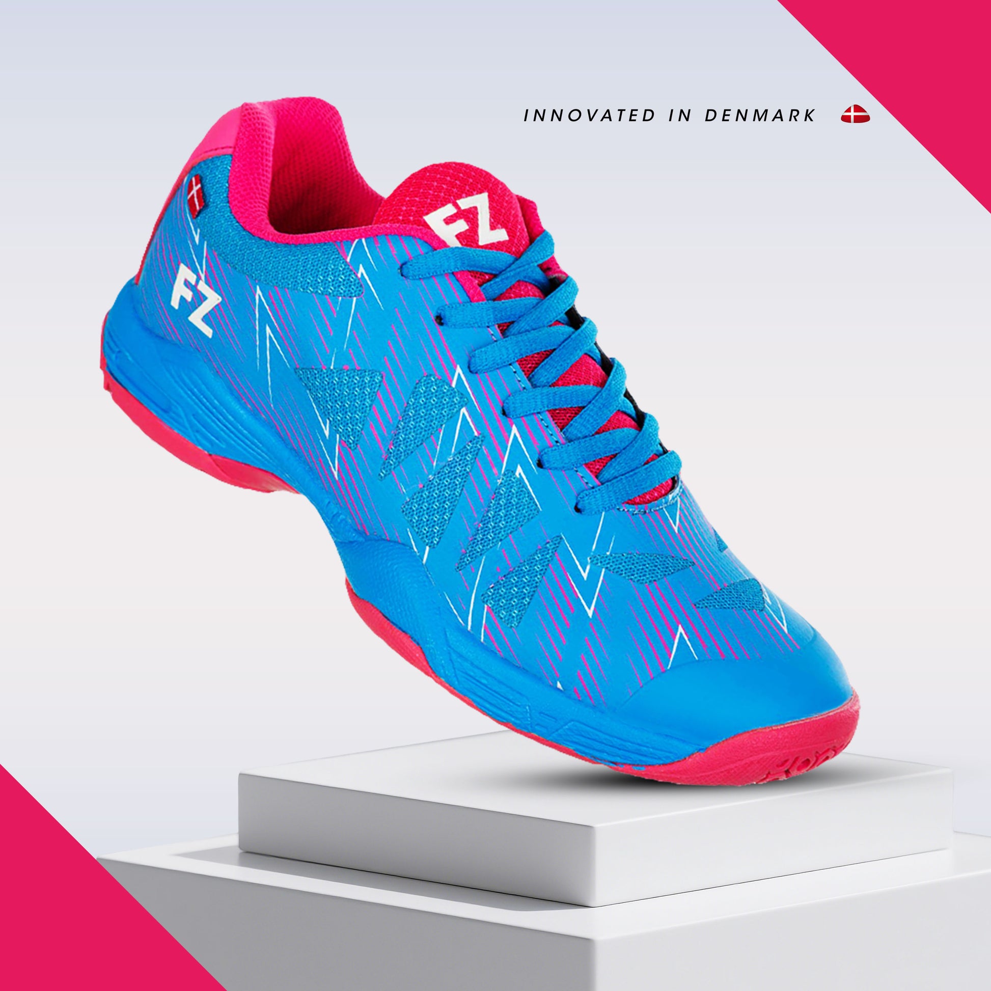 FZ Forza Taila shoes, blue badminton shoes, Drylex badminton footwear, F-Zone grip shoes, ASE support shoes, lace-up court shoes, breathable badminton footwear, lightweight sports shoes, Dura Coat badminton shoes, performance athletic shoes