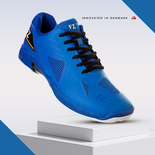 FZ Forza Vigorous shoes, blue badminton shoes, medium fit sports shoes, durable rubber sole shoes, lace-up court sneakers, training badminton shoes, athletic footwear for players