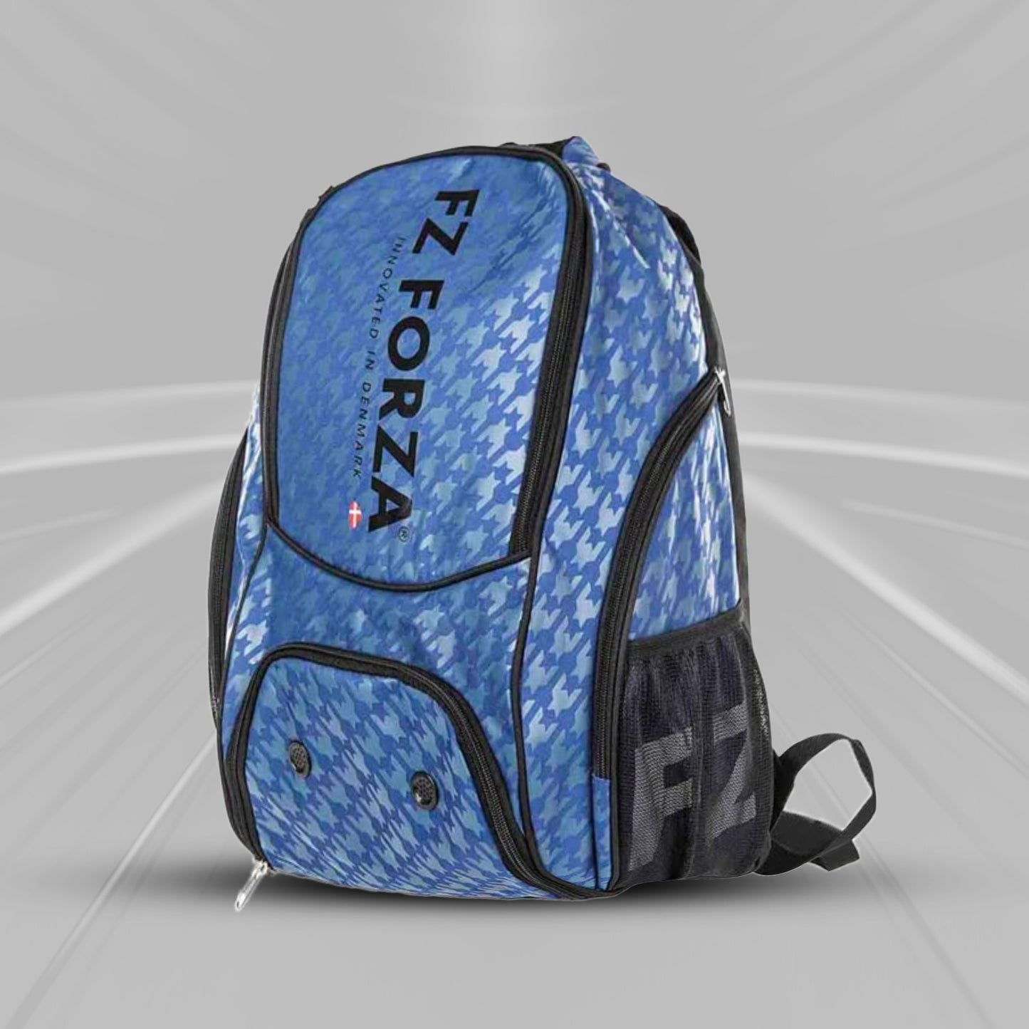 FZ Forza Estate Blue backpack, Lennon badminton backpack, estate blue print bag, sports backpack for athletes, dual strap racket backpack, durable FZ Forza bag, badminton gear bag blue, polyester blue backpack, training bag estate blue, sporty school bag