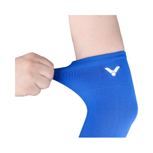 Victor elbow wrap, elastic elbow band, high compression brace, breathable joint support, black elbow strap, adjustable elbow sleeve, badminton elbow protector, tennis elbow gear, neoprene and spandex brace, gym-ready elbow wrap, flexible sports brace, joint pain gear, elbow tendon support, athletic arm support, durable elbow wrap