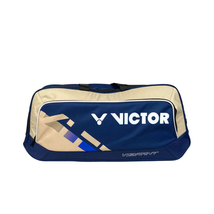 badminton kit bag, Victor BR5615, rectangular gear bag, racket compartment bag, insulated kit bag, shoe compartment, accessory pouch, Poseidon blue kit bag, pale khaki accents, large badminton bag, travel racket bag, professional kit bag, durable polyester bag, heat insulation for rackets, organised equipment bag